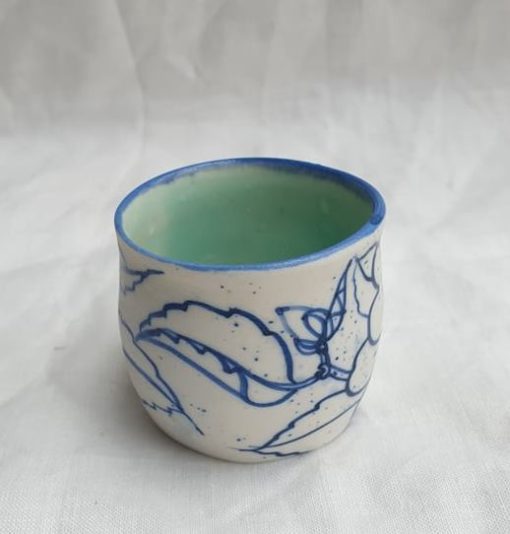 espresso floral cup in white porcelain with celadon glazed interior